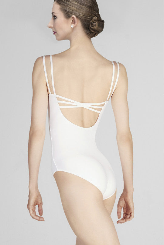 White swimsuit with thin straps on a plain background