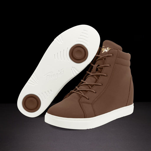 Brown high-top sneakers with white soles on a black background