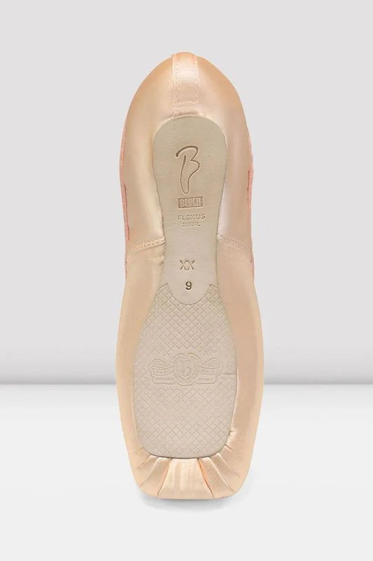 Ballet shoe with a beige sole on a white background