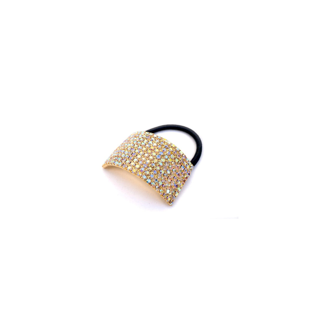Decorative hair tie with rhinestone embellishments on a white background