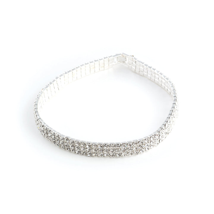 Silver headband with clear rhinestones on a white background