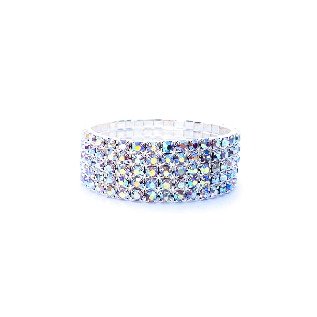 Multicolored gemstone ring on a white background