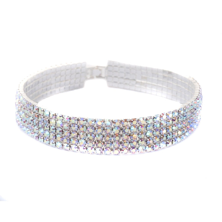 Silver headband with crystal-like stones on a white background