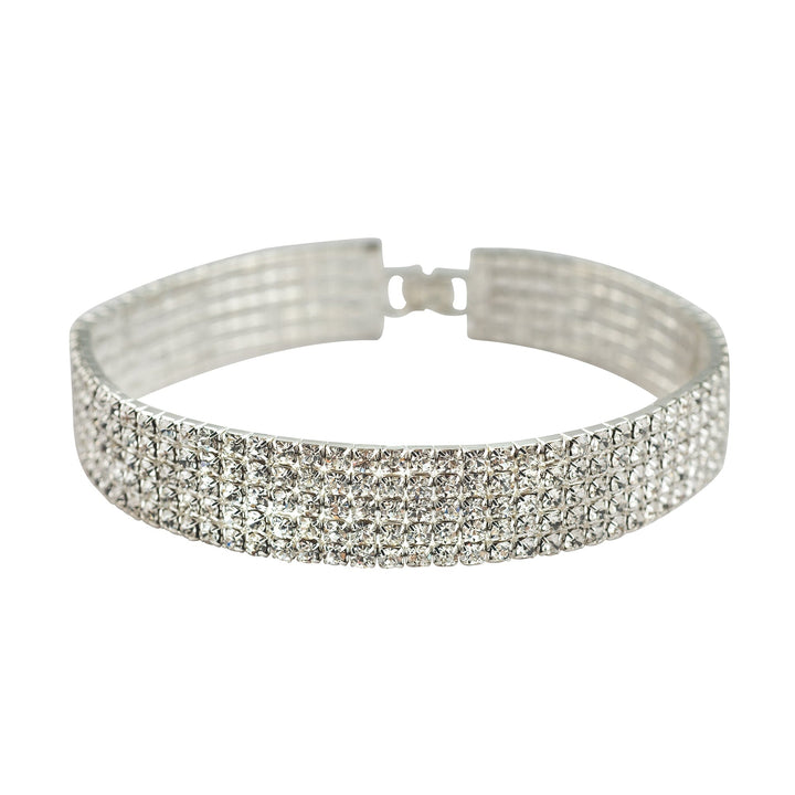Silver bracelet with clear stones on a white background