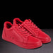 Red sneakers on a black background