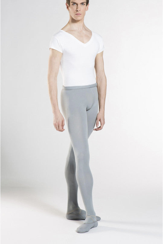 Person wearing a white top and gray tights on a plain background