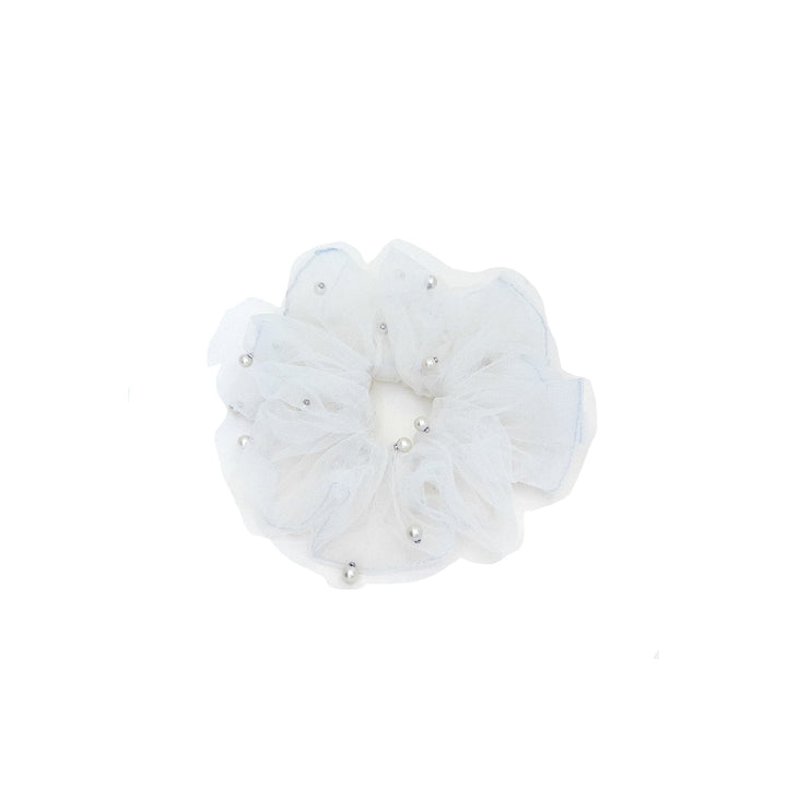 White scrunchie with pearls on a white background