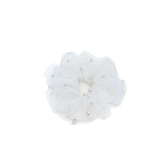 White scrunchie with pearls on a white background