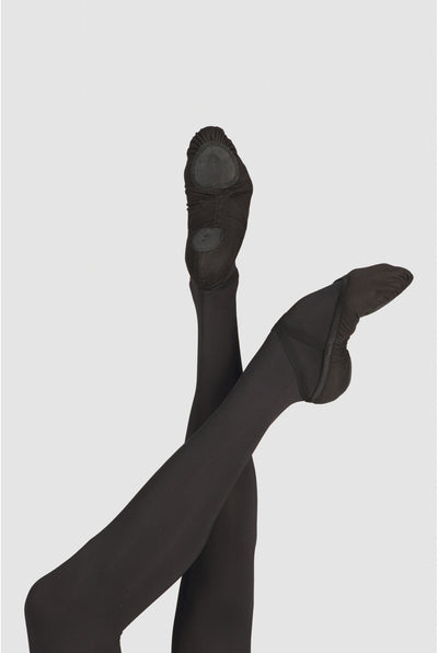 Black tights with black shoes on a light gray background