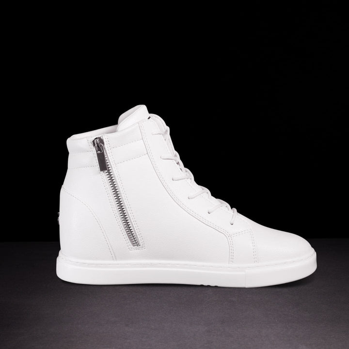 Side view of white sneaker