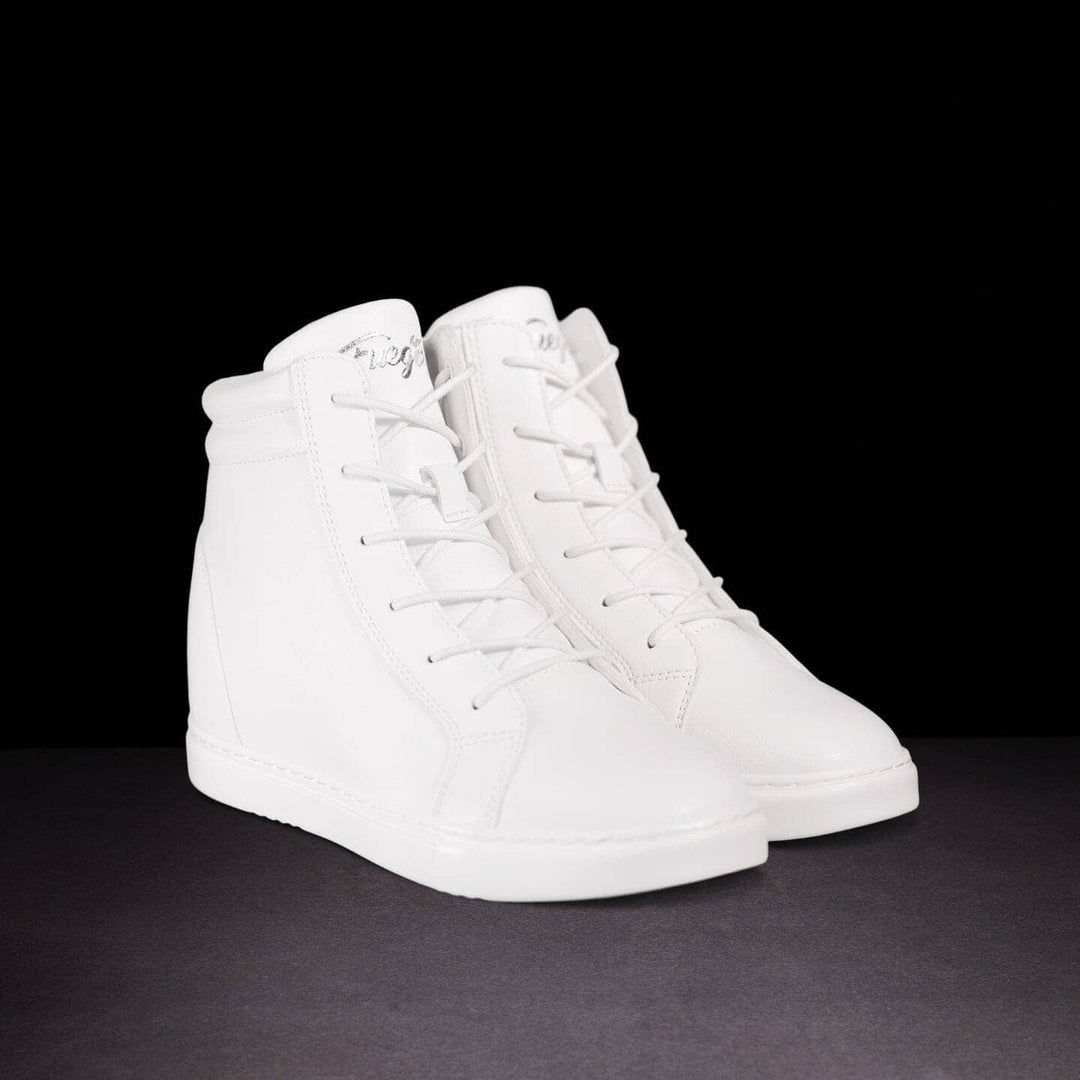 Front view of pair of white sneakers