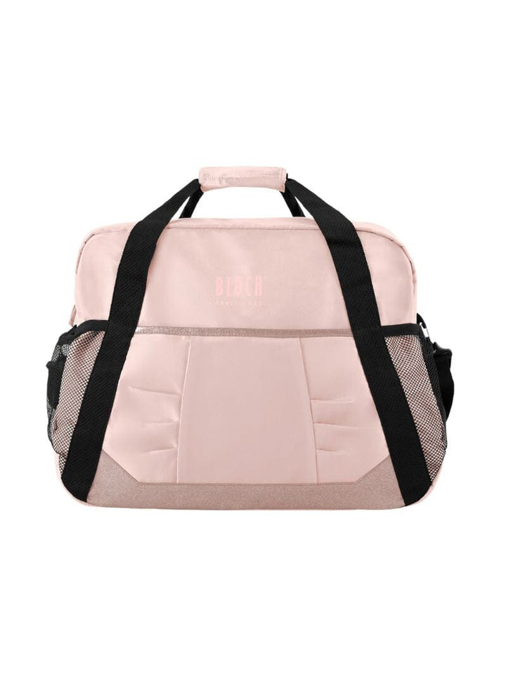 Pink duffel bag with black straps on a white background